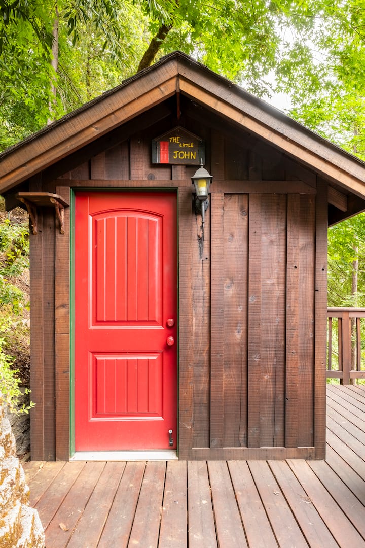 The Little John outhouse with bright red door on the sun deck