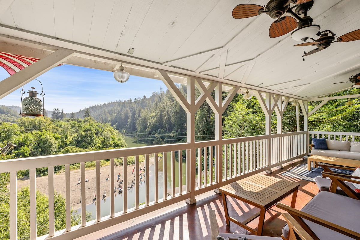 Porch with hanging lantern and river view